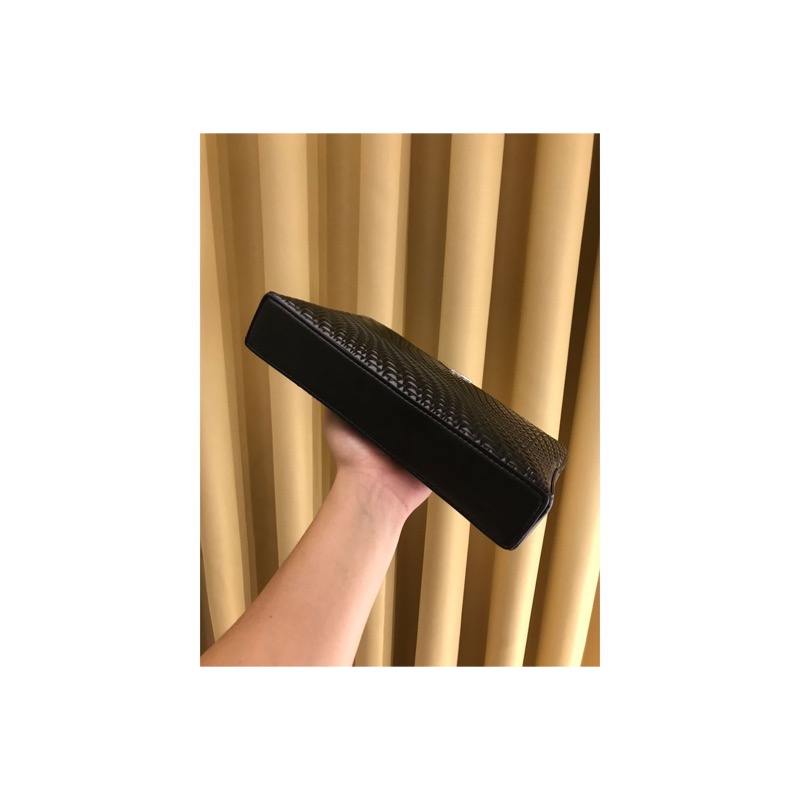 Louis Vuitton Saffiano Leather Clutch