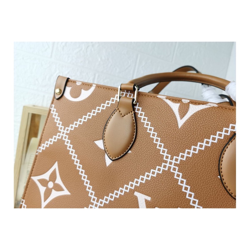 Louis Vuitton On The Go Monogram Bag