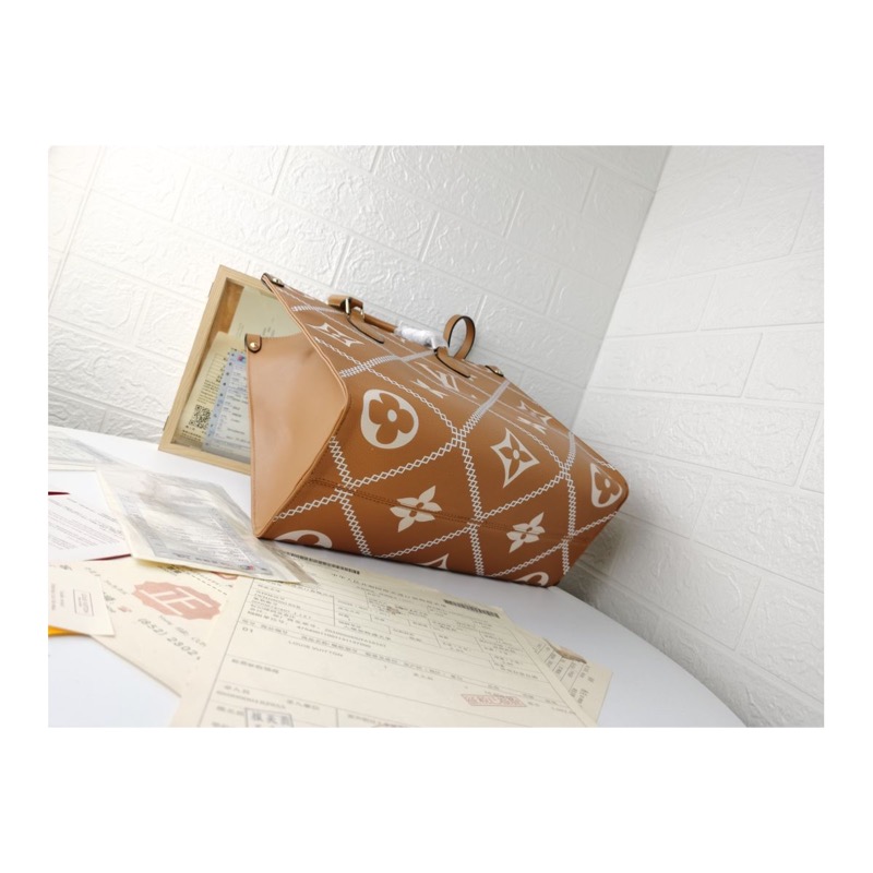 Louis Vuitton On The Go Monogram Bag