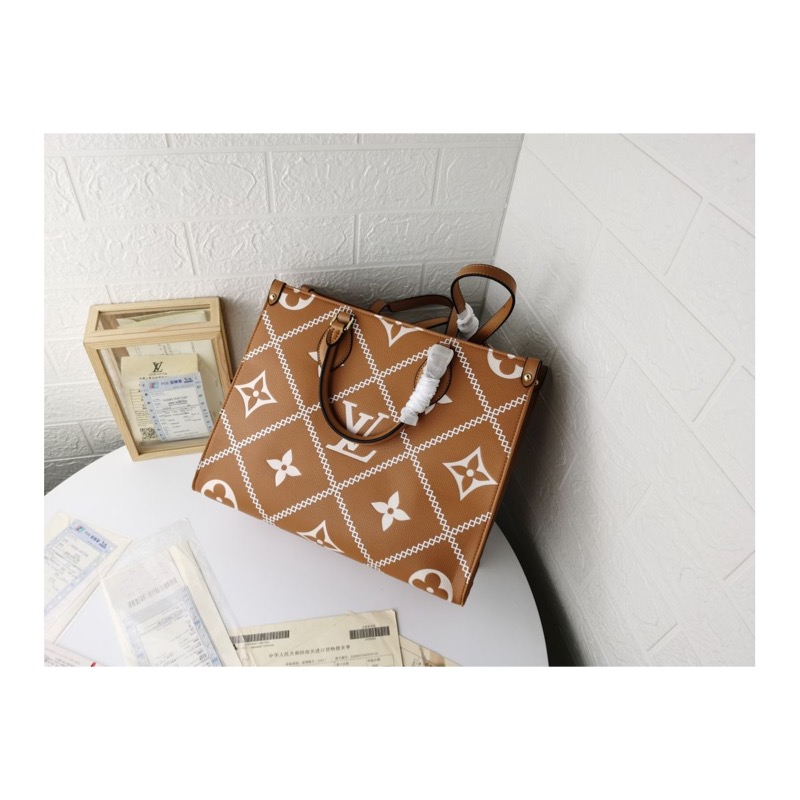 Louis Vuitton On The Go Monogram Bag