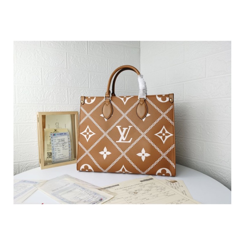 Louis Vuitton On The Go Monogram Bag